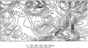 Contours of apparent conductivity measured with ground conductivity meter over dry farm land. Alberta, Canada. (Wood (1987) in McNeill (1990); copyright permission granted by Society of Exploration Geophysicists)