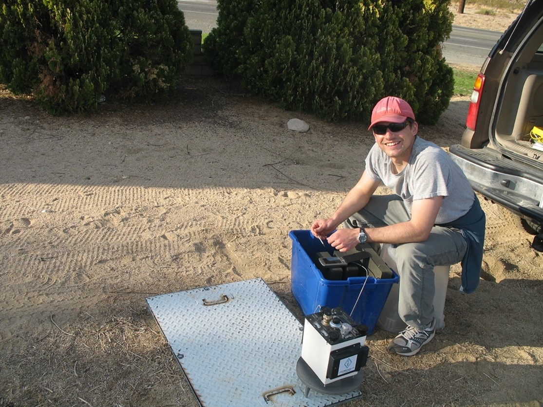 Figure 2. A USGS hydrologist prepares equipment to conduct a gravity survey to evaluate small variations in the Earth's gravity field (U.S. Geological Survey,2007).