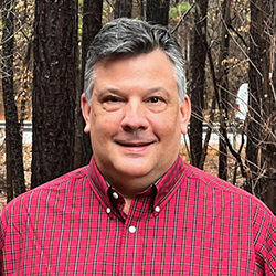 A photograph of Andrew Rodak, P.E.