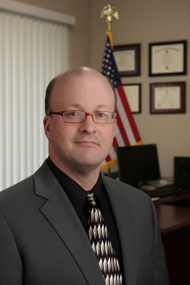 A photograph of Brian Englert