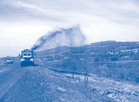 Figure 1. An aerospread truck was used to spray biosolids-based amendment onto soil across the former smelting area of Blue Mountain’s north slope.