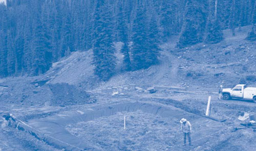 Figure 2. The biochemical reactor occupies a 35- by 35-foot area approximately 200 feet from the mine adit and 25 feet upgradient of the aerobic polishing cell.