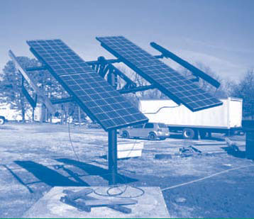 Figure 2. The passive solar tracking system at Busy Bee Laundry relies on transfer of a fluid (freon) from the east side to the west side of the PV mounting rack, as the sun continues to heat a reservoir throughout the day.