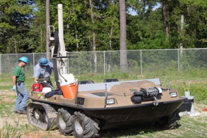 GeoProbe® deployment on a swamp buggy to install monitoring wells