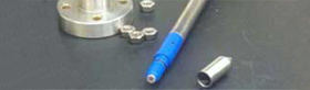 Acoustic probe tip and microphone embedded in the Delrin® isolator.