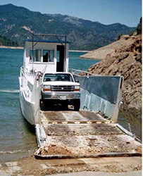 Vintage World War II landing craft used for transport across Lake Shasta