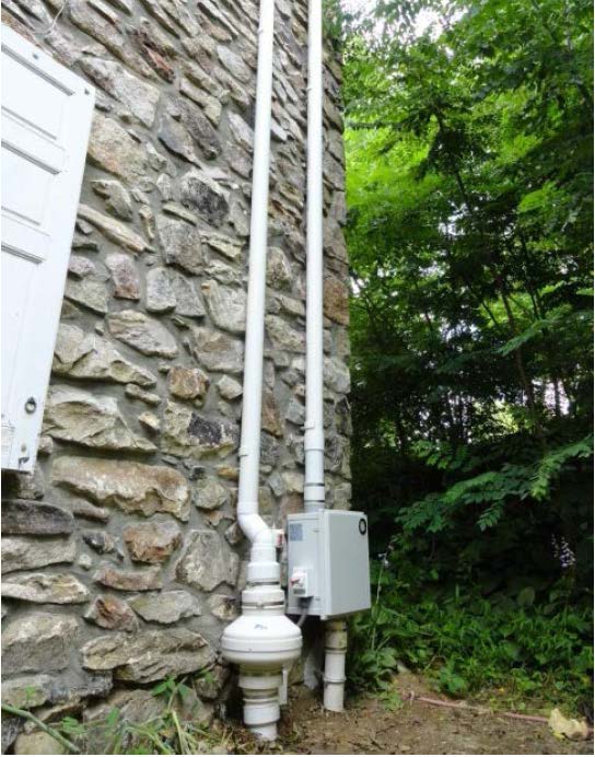 Figure 2. Typical residential exterior exhaust stack for a sub-slab depressurization system near the Crossley Farm site.