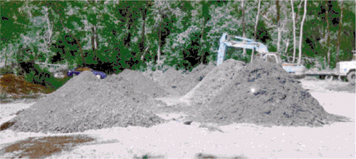 Compost treatment piles made with PCB contaminated soil. 